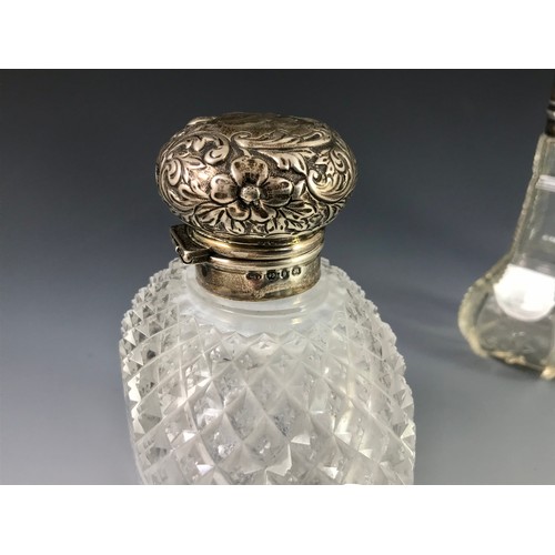 381 - VARIOUS PERFUME AND OTHER BOTTLES WITH SILVER TOPS AND COLLARS INCLUDING A PERFUME ATOMISER