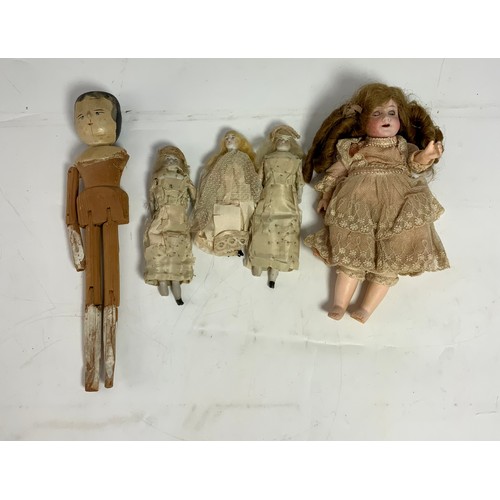 37 - ANTIQUE BISQUE HEAD AND WOODEN DOLLS MANY IN ORIGINAL LACE COSTUME INCLUDING MINIATURE DUTCH TYPE WO... 