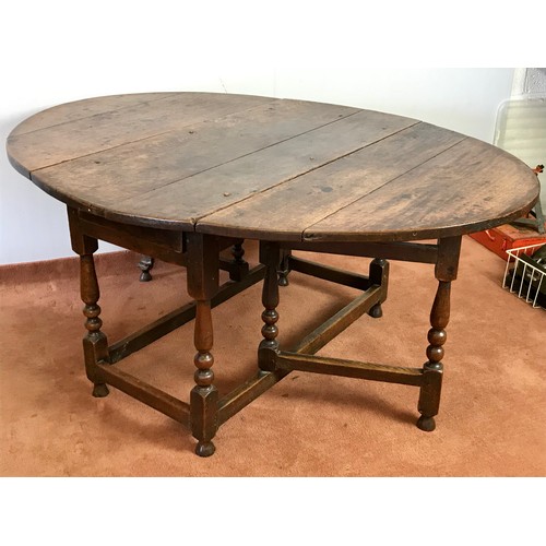 469 - ANTIQUE OAK OVAL TOP GATE LEG DROP LEAF DINING TABLE