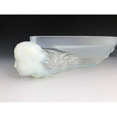 104 - BOAT SHAPED OPALESCENT GLASS DISH WITH OPAQUE MAIDEN HEAD SUPPORTS IN THE LALIQUE STYLE, MOULDED ETL... 