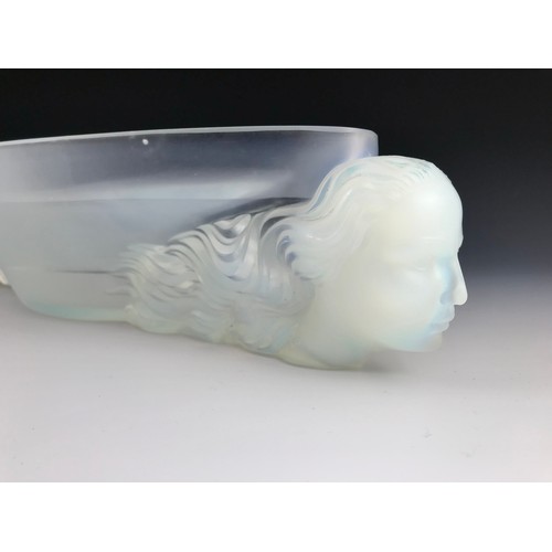 104 - BOAT SHAPED OPALESCENT GLASS DISH WITH OPAQUE MAIDEN HEAD SUPPORTS IN THE LALIQUE STYLE, MOULDED ETL... 