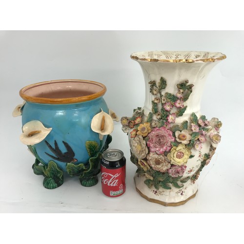 156 - MAJOLICA JARDINERE WITH APPLIED LILY DECORATION TOGETHER WITH FLOWER ENCRUSTED VASE, BOTH AF