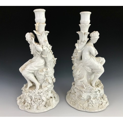 199 - PAIR OF CONTINENTAL FIGURAL PORCELAIN CANDLESTICKS