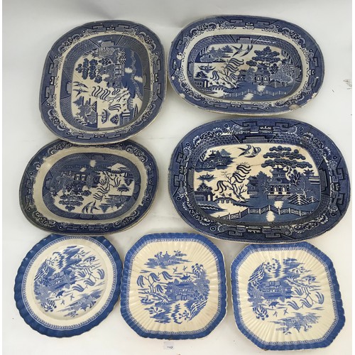 142 - 4 WILLOW PATTERN BLUE AND WHITE MEAT PLATES AND 3 COPELAND BLUE AND WHITE WILLOW PATTERN PLATES