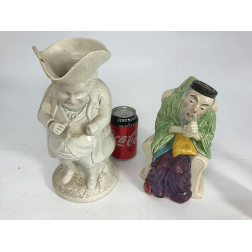 160 - WHITE GLAZED TOBY JUG AND ONE OTHER JUG IN THE FORM OF A SEATED ORIENTAL GENTLEMAN