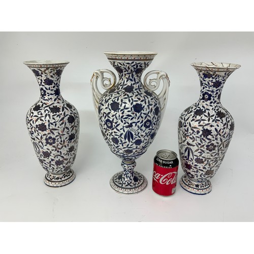 163 - PAIR OF BLUE AND WHITE BALUSTER VASES AND MATCHING URN