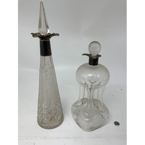 111 - 2 DECANTERS WITH SILVER COLLARS