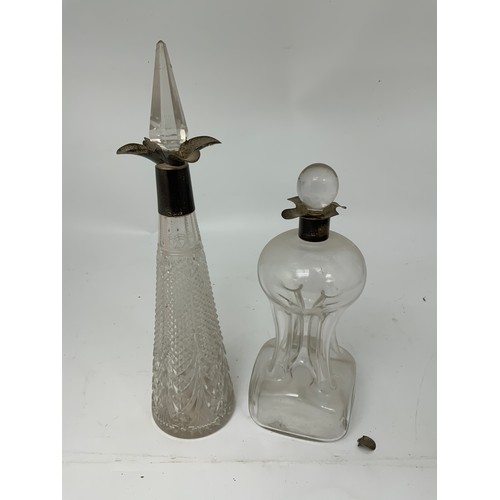 111 - 2 DECANTERS WITH SILVER COLLARS