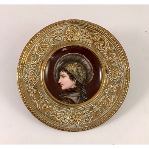 181 - PORCELAIN PLATE IN GILT BRASS FRAME