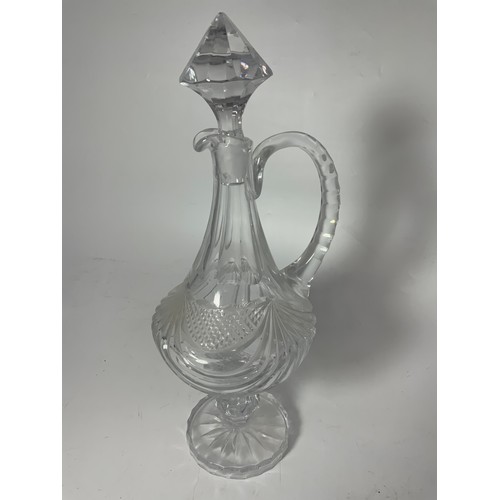 102 - LARGE GLASS JUG