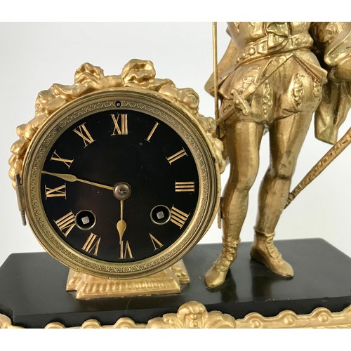 280 - CONTINENTAL BLACK MARBLE AND ORMOLU MANTLE CLOCK MOUNTED WITH A FIGURE OF A KNIGHT BEARING A STANDAR... 