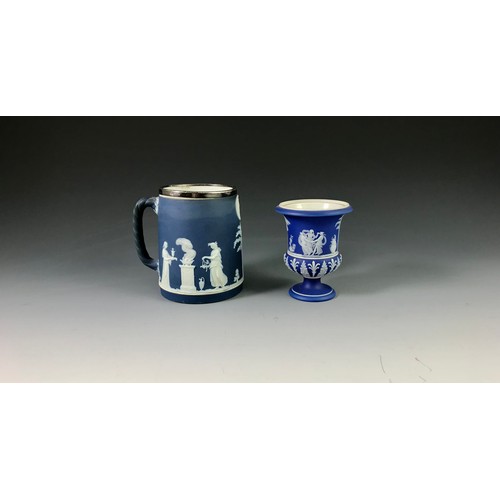 187 - WEDGWOOD JASPER WARE INCLUDING AN AMPHORA VASE AND A TANKARD WITH SILVER RIM