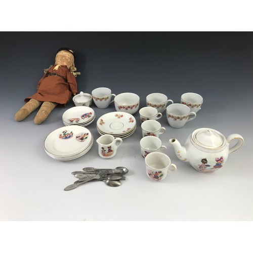 493 - DOLLS TEA SET AND A RAG DOLL DRESSED AS A BROWNIE