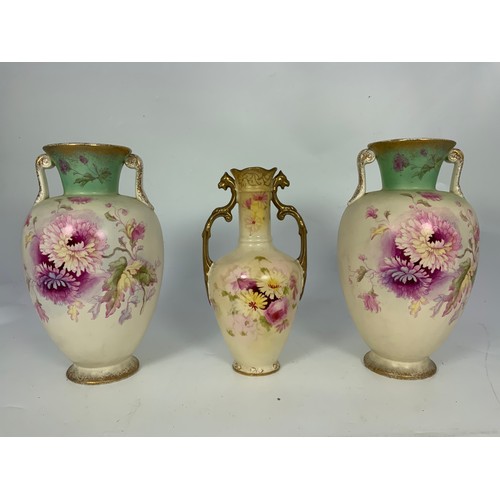 174 - A PAIR AND ONE OTHER BLUSH IVORY VASES