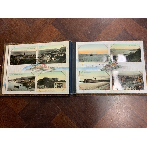 91 - JAPANESE LACQUERED POSTCARD ALBUMS AND CONTENTS