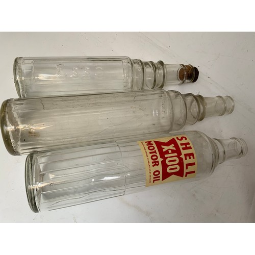 9 - 3 GLASS OIL BOTTLES, SHELL EX-100 MOTOR OIL WITH LABEL ESSO LUBE AND ESSO