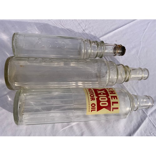 9 - 3 GLASS OIL BOTTLES, SHELL EX-100 MOTOR OIL WITH LABEL ESSO LUBE AND ESSO