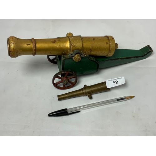 59 - PAINTED WOODEN TOY CANNON TOGETHER WITH A BARREL OF A TABLE CANNON