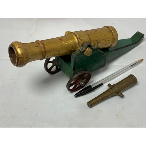 59 - PAINTED WOODEN TOY CANNON TOGETHER WITH A BARREL OF A TABLE CANNON