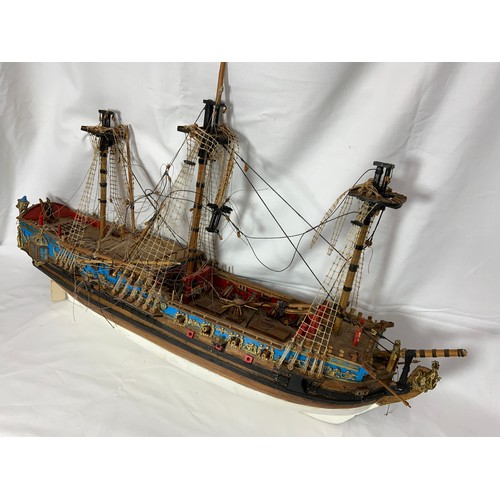 69 - 2 LARGE WOODEN HAND BUILT GALLEON MODELS, LARGEST APPROX. 72cms 1 IN NEED OF RESTORATION THE OTHER R... 