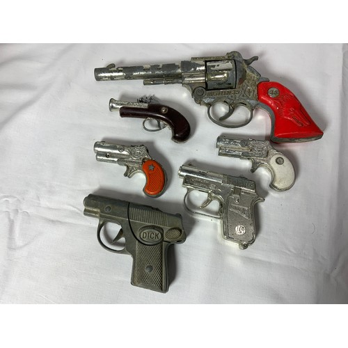 57 - VARIOUS VINTAGE CAP GUNS