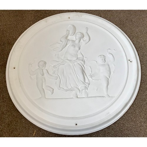 278 - LARGE DECORATIVE PLASTER ROUNDAL WITH CLASSICAL RELIEF DECORATION APPROX. 85cm DIAMETER