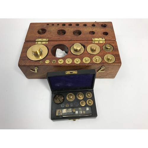 644 - CASED SET OF WEIGHTS FROM 1 GRAM TO 2000 GRAMS PLUS A SMALL CASE SET OF LABARATORY WEIGHTS