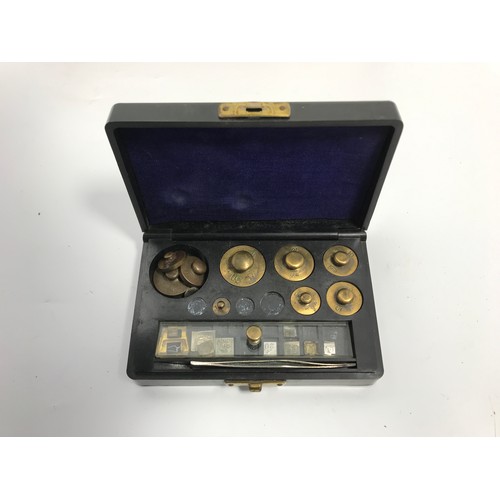 644 - CASED SET OF WEIGHTS FROM 1 GRAM TO 2000 GRAMS PLUS A SMALL CASE SET OF LABARATORY WEIGHTS