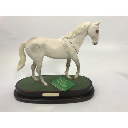 147 - ROYAL DOULTON DESERT ORCHID MODEL  WITH BRONZE EFFECT HORSE MODEL AND A MINIATURE HORSE MODEL