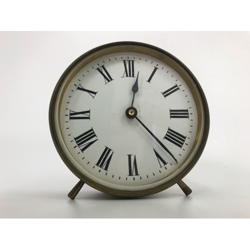 353 - BRASS CASED CLOCK