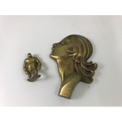 424 - 3 CAST DOOR STOPS TOGETHER WITH A FIGURE OF A GORILLA AND A BRASS MASK