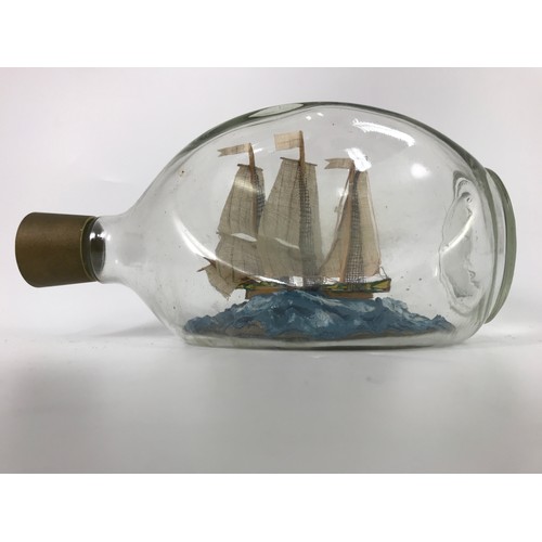 580 - SHIP IN A DIMPLE BOTTLE TOGETHER WITH 2 OLD TILES