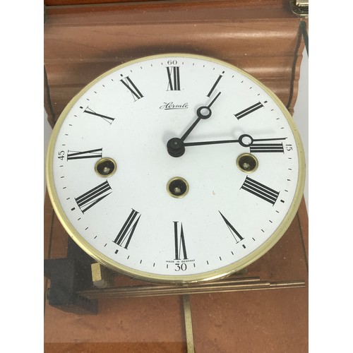 339 - A MODERN GLASS CASED HERMLE PENDULUM WALL CLOCK