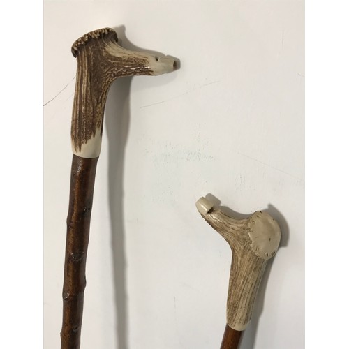 539 - 2 ANTLER HANDLED THUMB STICKS WITH WHISTLES ON HANDLES