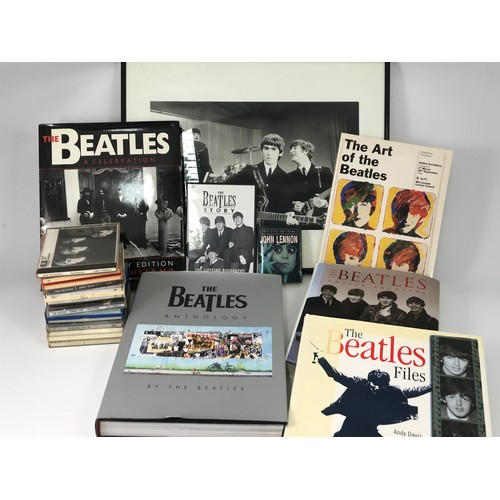 306 - BOX OF BEATLES MEMORABILIA INC BOOKS, CDS, DVD AND FRAMED PHOTOGRAPH