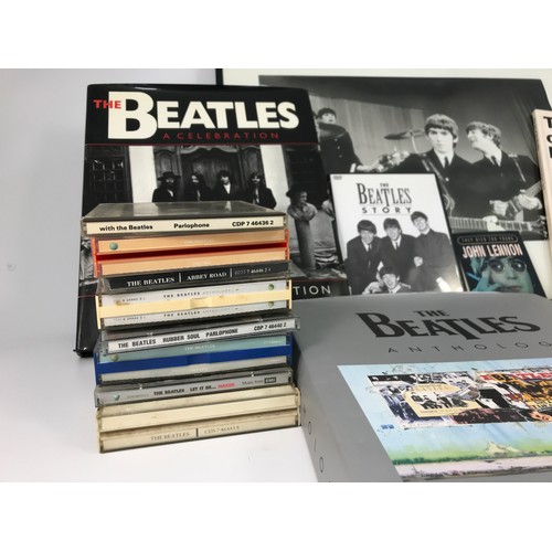 306 - BOX OF BEATLES MEMORABILIA INC BOOKS, CDS, DVD AND FRAMED PHOTOGRAPH