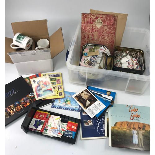 282 - BOX 74 PRESTIGE BLCKS £90 IN FACE OF 1ST CLASS BKLTS, COUPLE OF YEAR ALBUMS, SET OF MUGS