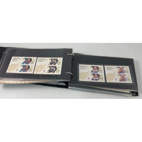 286 - BLACK MERLIN ALBUM WITH 126 X 2012 GOLD MEDAL WINNERS STAMPS IN SHEETLETS AND PAIRS PLUS OTHER UK SH... 