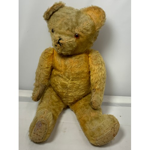 54 - VINTAGE TEDDY BEAR APPROX 22 INCHES TALL WITH LEATHER PAWS PADDED FEET, APPEARS STRAW STUFFED, PLUS ... 