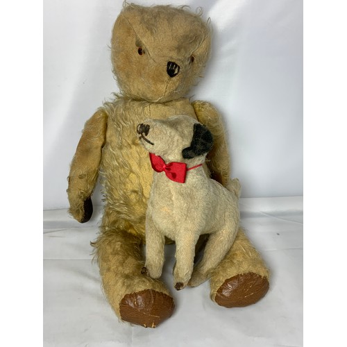 66 - LARGE VINTAGE STRAW FILLED TEDDY BEAR, BLACK NOSE T/W A VINTAGE STRAW FILLED DOG