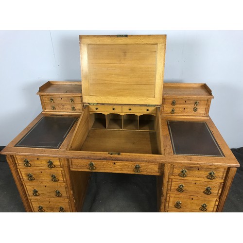 76 - TWIN PEDESTAL DESK, WITH UNUSUAL LOWER DRAW AND SLOPED WRITING TOP