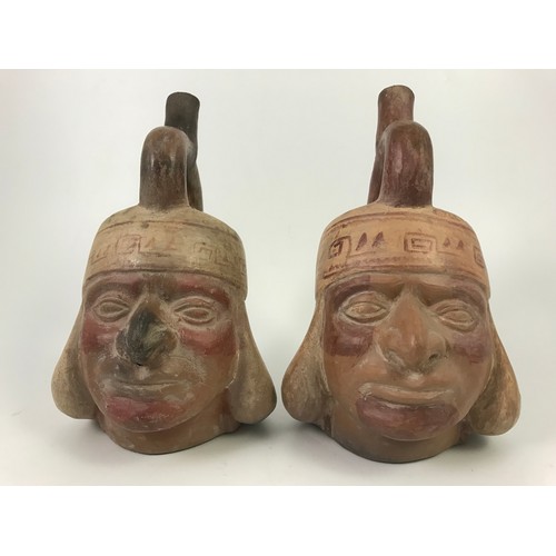 215 - A PAIR OF PRE COLUMBIAN STYLE POTTERY VASES