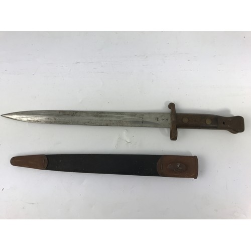 42 - MILITARY BAYONET WITH CROSS SWORD MARK EFD IN LEATHER SHEATH