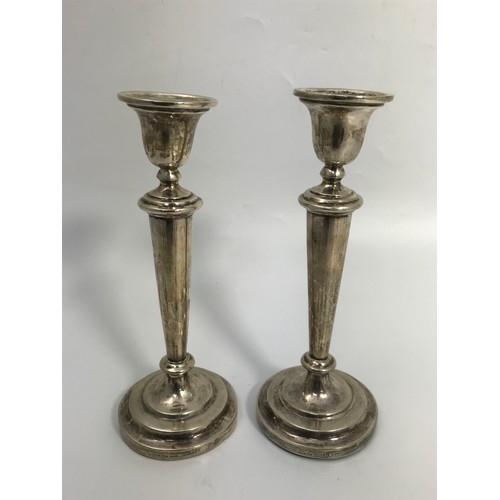 332 - PAIR OF STERLING LOADED CANDLESTICKS