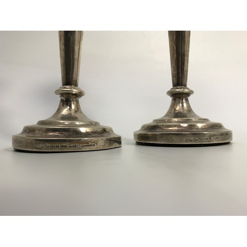 332 - PAIR OF STERLING LOADED CANDLESTICKS