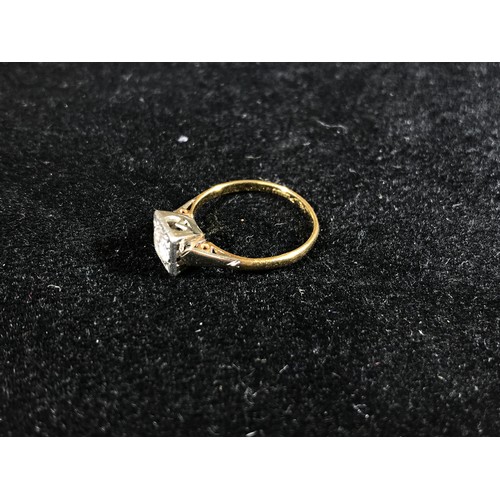 497 - SQUARE SET SOLITAIRE DIAMOND RING ON 18ct GOLD BAND