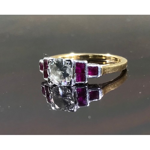 495 - DIAMOND SOLITAIRE RING WITH BAGUETTE CUT RUBIES TO THE SHOULDERS ON 18ct BAND