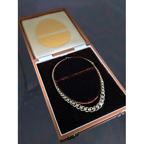 504 - HEAVY CURB NECKLACE IN CHAINCRAFT CASE MARKED FOR 9ct GOLD, APPROX. 53g