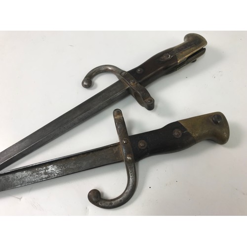 45 - 2 CHASSEPOT TYPE BAYONETS, each approx. 64 with inscriptions to edge of blade