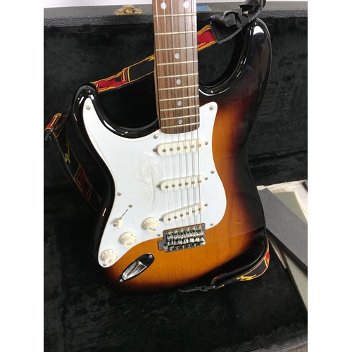 153 - SQUIRE STRAT ELECTRIC GUITAR IN HARD TRAVEL CASE